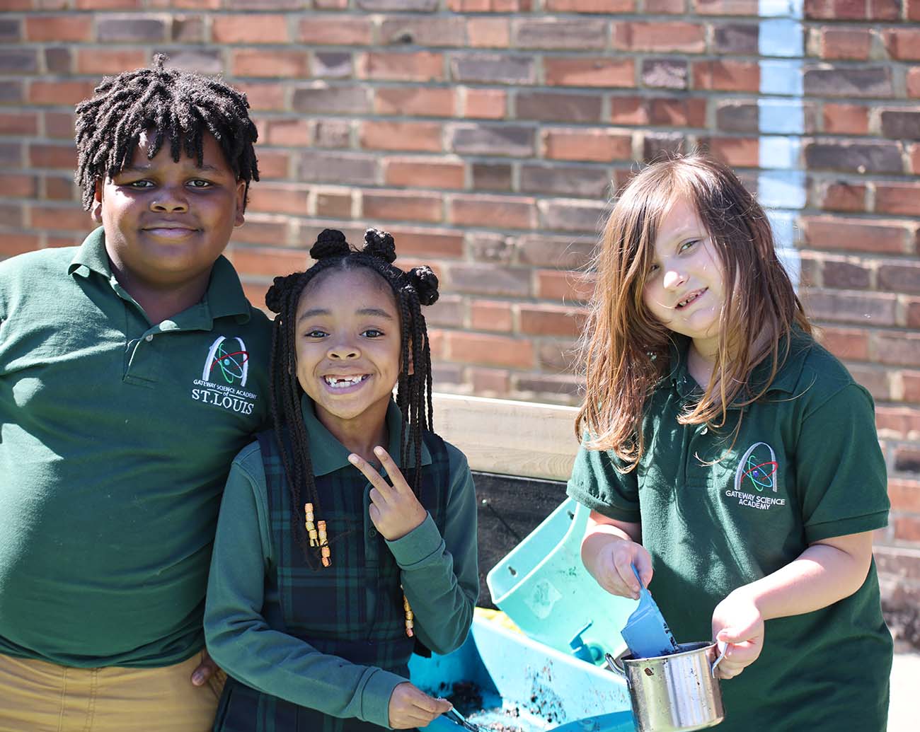Teacher or school staff member warmly interacting with a student outside
